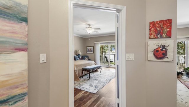 113 SE Brooks St Unit 204, Fort Walton Beach, FL 32548 - corridor featuring crown molding and wood finished floors