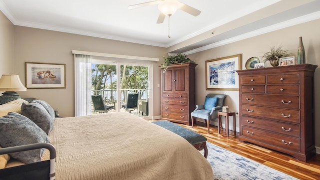 113 SE Brooks St Unit 204, Fort Walton Beach, FL 32548 - bedroom featuring access to outside, light wood-style floors, crown molding, and ceiling fan