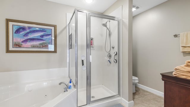 113 SE Brooks St Unit 204, Fort Walton Beach, FL 32548 - bathroom featuring a stall shower, a whirlpool tub, and tile patterned flooring
