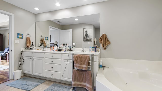 113 SE Brooks St Unit 204, Fort Walton Beach, FL 32548 - full bathroom featuring double vanity, a jetted tub, tile patterned floors, and recessed lighting