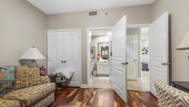113 SE Brooks St Unit 204, Fort Walton Beach, FL 32548 - living area with wood finished floors and baseboards