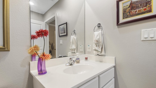 113 SE Brooks St Unit 204, Fort Walton Beach, FL 32548 - bathroom with vanity and a textured wall