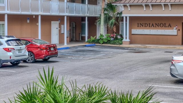 113 SE Brooks St Unit 204, Fort Walton Beach, FL 32548 - view of property featuring uncovered parking
