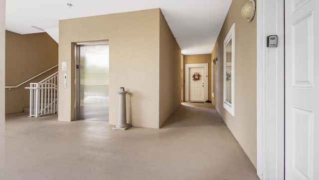 113 SE Brooks St Unit 204, Fort Walton Beach, FL 32548 - hall with elevator, carpet floors, and stairs