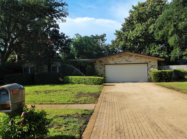 8 NE Carlyle Ct, Fort Walton Beach, FL 32547 - view of front facade with brick siding and a front yard