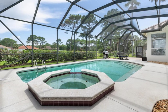527 Indigo Loop, Miramar Beach, FL 32550 - view of pool featuring a pool with connected hot tub, a patio, a grill, and a lanai