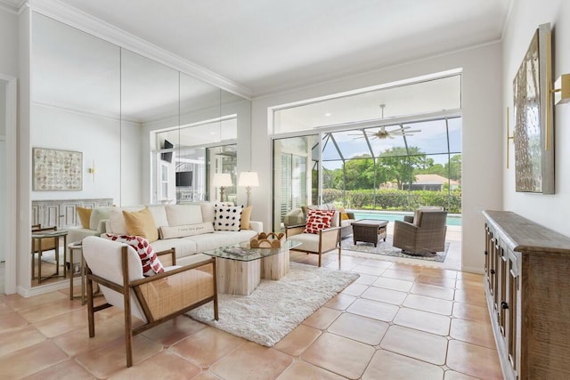 527 Indigo Loop, Miramar Beach, FL 32550 - living area with crown molding, a sunroom, a ceiling fan, and light tile patterned flooring