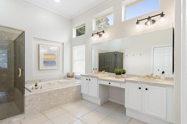 527 Indigo Loop, Miramar Beach, FL 32550 - full bath featuring double vanity, a shower stall, a bath, a high ceiling, and tile patterned floors
