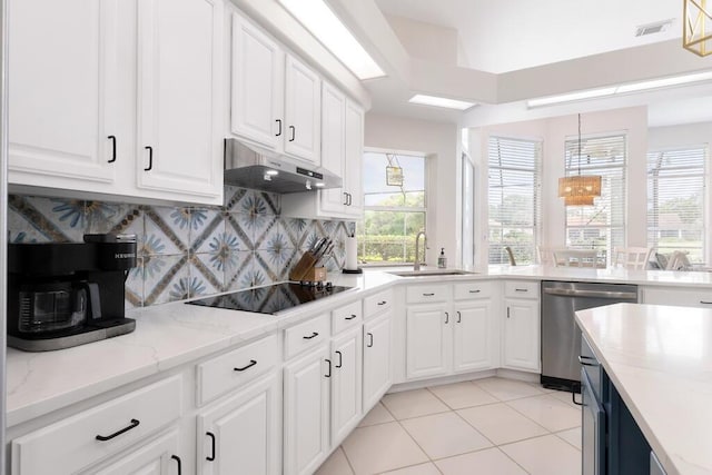 527 Indigo Loop, Miramar Beach, FL 32550 - kitchen featuring dishwasher, black electric cooktop, under cabinet range hood, a sink, and decorative backsplash