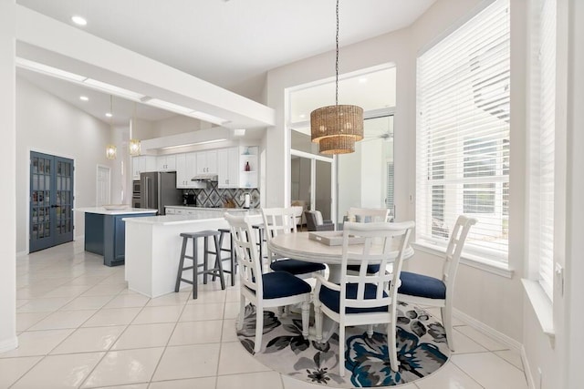 527 Indigo Loop, Miramar Beach, FL 32550 - dining space featuring a chandelier, light tile patterned flooring, baseboards, and recessed lighting