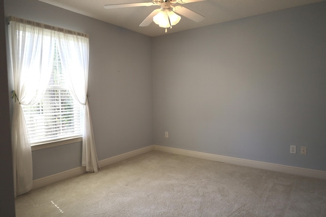 222 Wekiva Cv, Destin, FL 32541 - empty room with light carpet, a ceiling fan, and baseboards