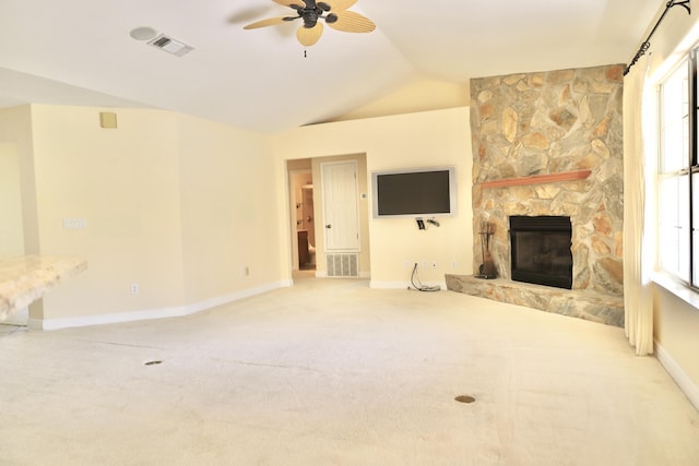 222 Wekiva Cv, Destin, FL 32541 - unfurnished living room featuring a ceiling fan, vaulted ceiling, baseboards, carpet, and healthy amount of natural light