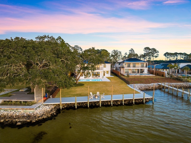 253 Driftwood Point Rd, Santa Rosa Beach, FL 32459 - dock with a water view, a balcony, an outdoor pool, and a patio area