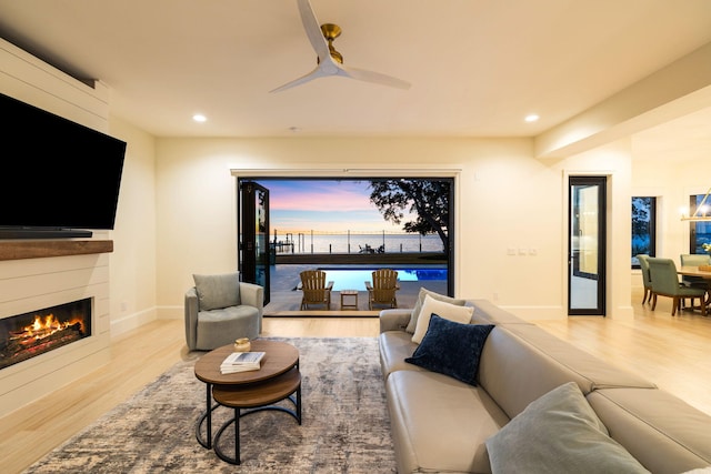 253 Driftwood Point Rd, Santa Rosa Beach, FL 32459 - living room with wood finished floors, a glass covered fireplace, recessed lighting, baseboards, and a ceiling fan