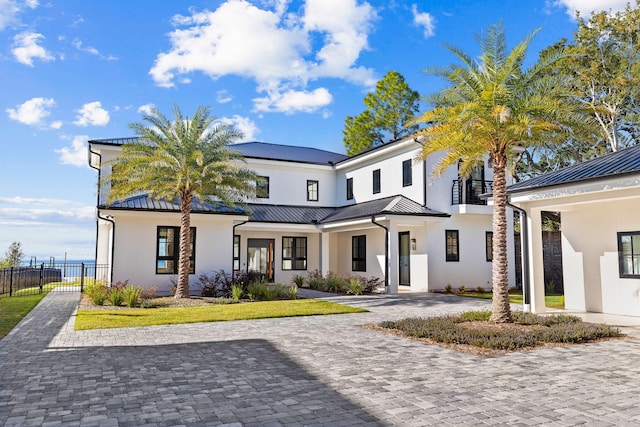 253 Driftwood Point Rd, Santa Rosa Beach, FL 32459 - view of front of house featuring a standing seam roof, metal roof, and stucco siding