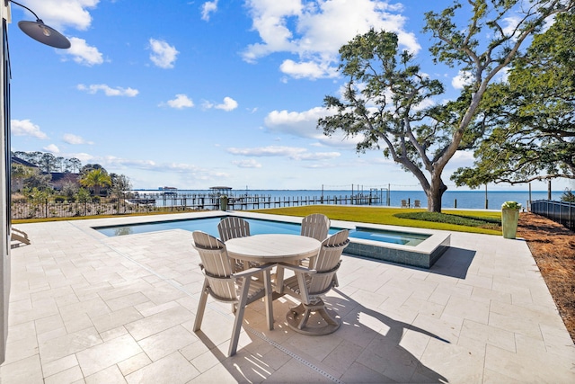 253 Driftwood Point Rd, Santa Rosa Beach, FL 32459 - view of swimming pool featuring a patio area, an in-ground hot tub, and a water view