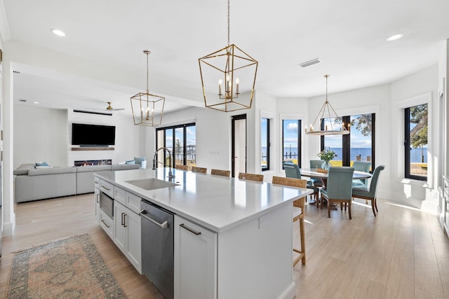 253 Driftwood Point Rd, Santa Rosa Beach, FL 32459 - kitchen featuring a sink, a chandelier, dishwasher, an island with sink, and recessed lighting