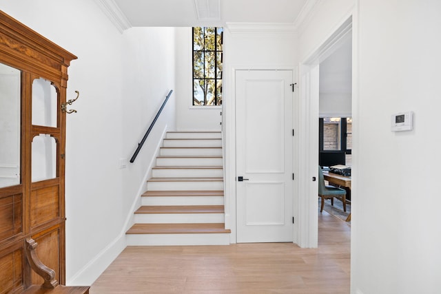 253 Driftwood Point Rd, Santa Rosa Beach, FL 32459 - staircase with wood finished floors, ornamental molding, and baseboards