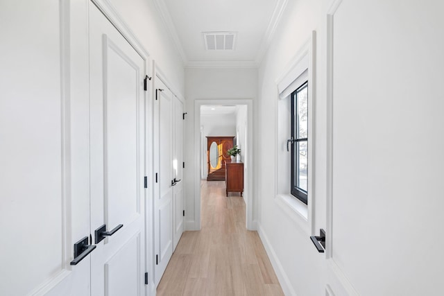 253 Driftwood Point Rd, Santa Rosa Beach, FL 32459 - hallway with plenty of natural light, light wood-type flooring, and crown molding