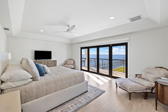253 Driftwood Point Rd, Santa Rosa Beach, FL 32459 - bedroom featuring a tray ceiling, access to outside, light wood finished floors, recessed lighting, and ceiling fan