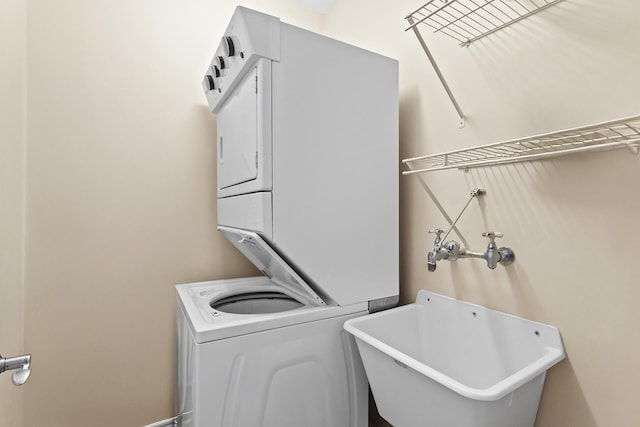 1653 W County Highway 30a Unit 1119, Santa Rosa Beach, FL 32459 - laundry area featuring estacked washer and dryer