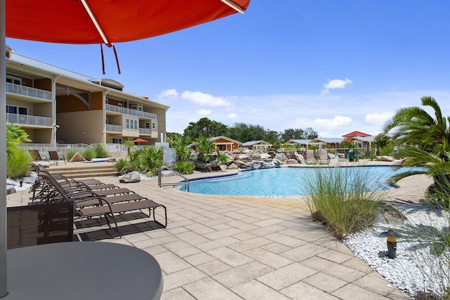 1653 W County Highway 30a Unit 1119, Santa Rosa Beach, FL 32459 - community pool with a patio area