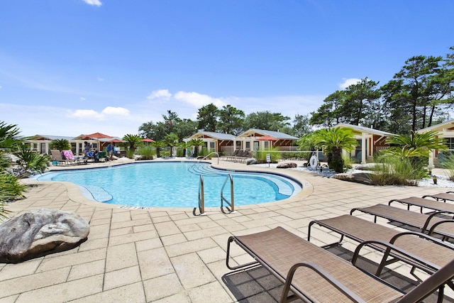 1653 W County Highway 30a Unit 1119, Santa Rosa Beach, FL 32459 - community pool featuring a patio area