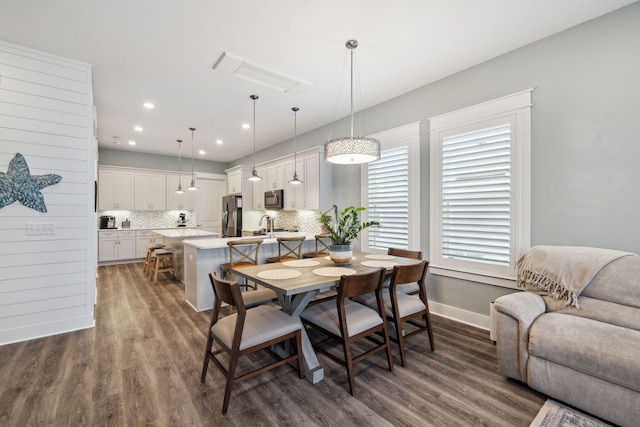 38 Constant Ave, Santa Rosa Beach, FL 32459 - dining space with dark wood-type flooring, recessed lighting, and baseboards