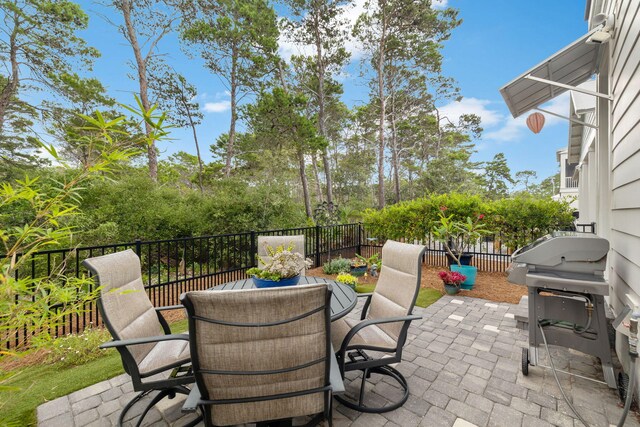 38 Constant Ave, Santa Rosa Beach, FL 32459 - view of patio / terrace with outdoor dining area and area for grilling