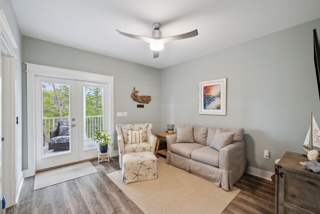 38 Constant Ave, Santa Rosa Beach, FL 32459 - living area with french doors, wood finished floors, ceiling fan, and baseboards