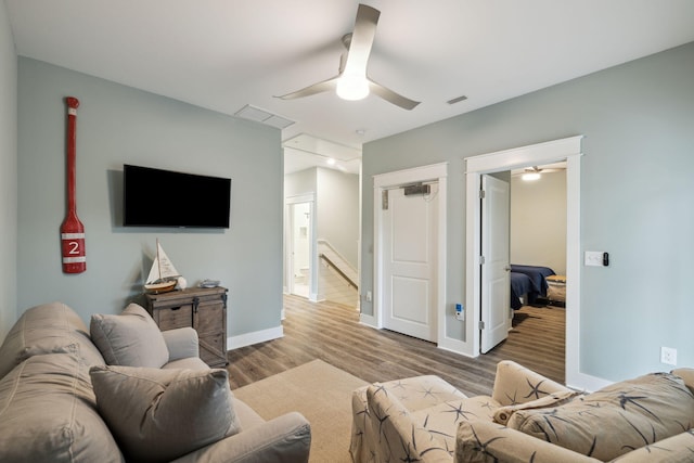 38 Constant Ave, Santa Rosa Beach, FL 32459 - living area featuring a ceiling fan, wood finished floors, and baseboards
