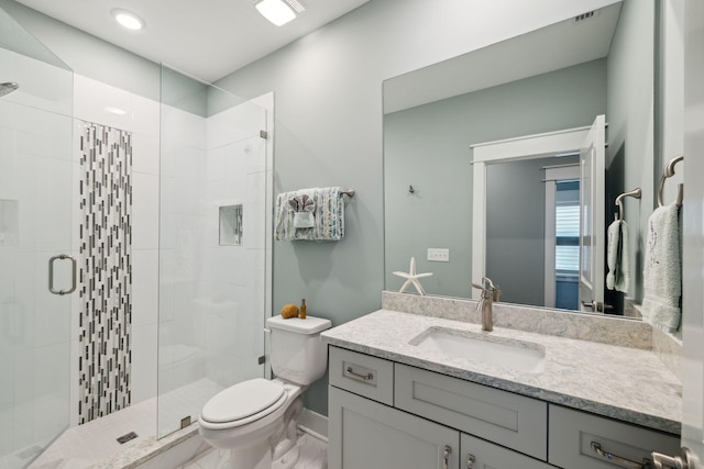 38 Constant Ave, Santa Rosa Beach, FL 32459 - bathroom with toilet, vanity, a stall shower, and baseboards