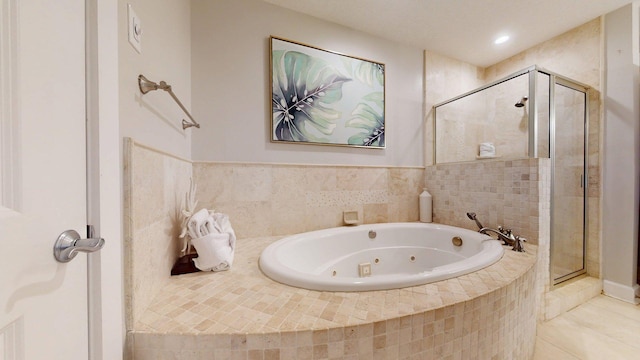 11807 Front Beach Rd Unit 1- 2204, Panama City Beach, FL 32407 - bathroom featuring a shower stall, a jetted tub, tile patterned floors, and recessed lighting