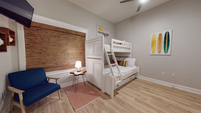 11807 Front Beach Rd Unit 1- 2204, Panama City Beach, FL 32407 - bedroom featuring wood finished floors, baseboards, and a ceiling fan