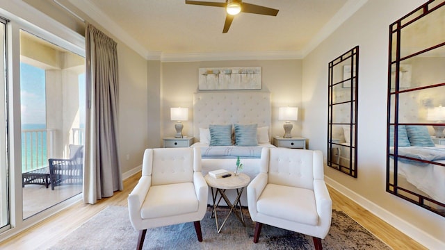11807 Front Beach Rd Unit 1- 2204, Panama City Beach, FL 32407 - sitting room featuring wood finished floors, a ceiling fan, crown molding, and baseboards