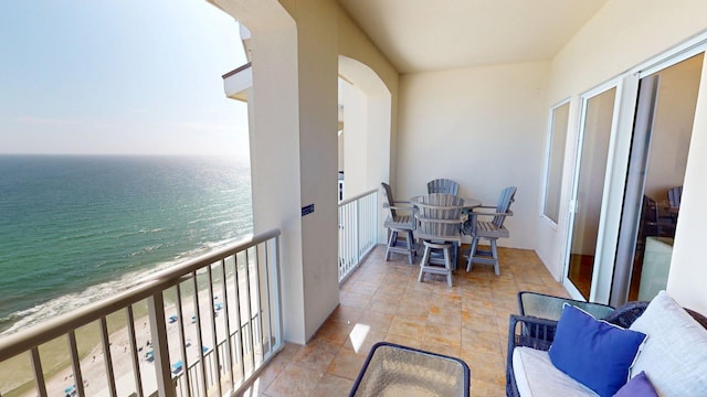 11807 Front Beach Rd Unit 1- 2204, Panama City Beach, FL 32407 - balcony featuring view of water and beach and outdoor dining space