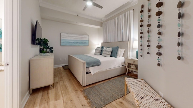 11807 Front Beach Rd Unit 1- 2204, Panama City Beach, FL 32407 - bedroom featuring ornamental molding, light wood-type flooring, baseboards, and a ceiling fan