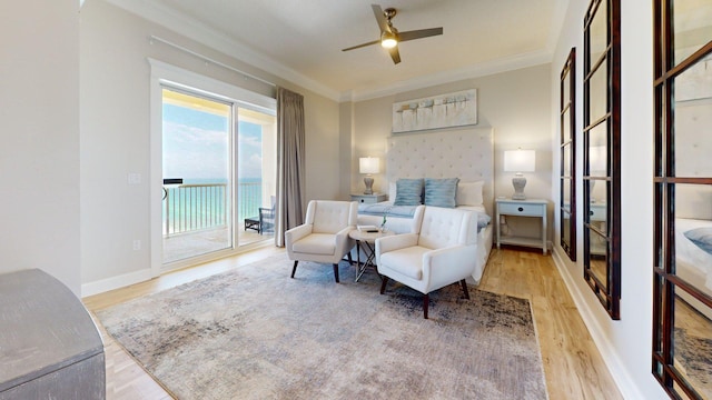 11807 Front Beach Rd Unit 1- 2204, Panama City Beach, FL 32407 - bedroom with access to exterior, light wood finished floors, crown molding, and baseboards