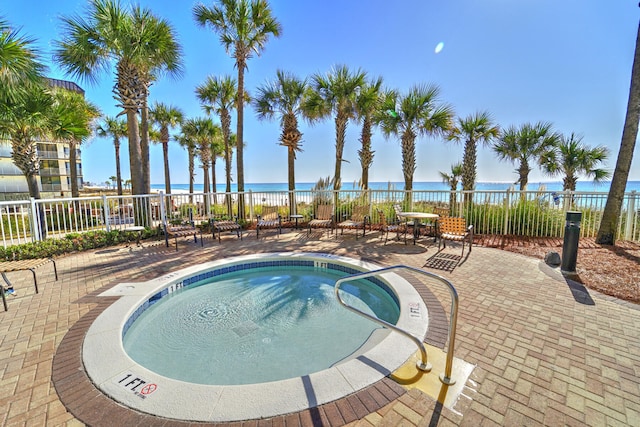 11807 Front Beach Rd Unit 1- 2204, Panama City Beach, FL 32407 - view of swimming pool featuring a water view and a patio