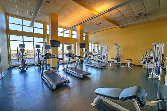 11807 Front Beach Rd Unit 1- 2204, Panama City Beach, FL 32407 - workout area with a towering ceiling and a drop ceiling