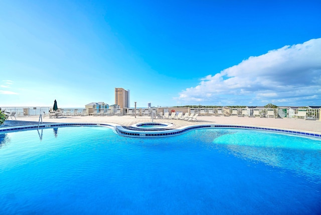 11807 Front Beach Rd Unit 1- 2204, Panama City Beach, FL 32407 - community pool featuring a community hot tub and a patio area
