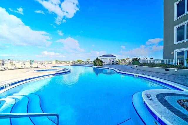 11807 Front Beach Rd Unit 1- 2204, Panama City Beach, FL 32407 - community pool with a patio area