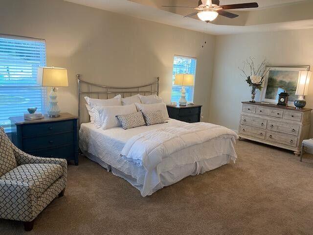 115 S Speckled Trout Ln Lot 262, Freeport, FL 32439 - carpeted bedroom with a ceiling fan