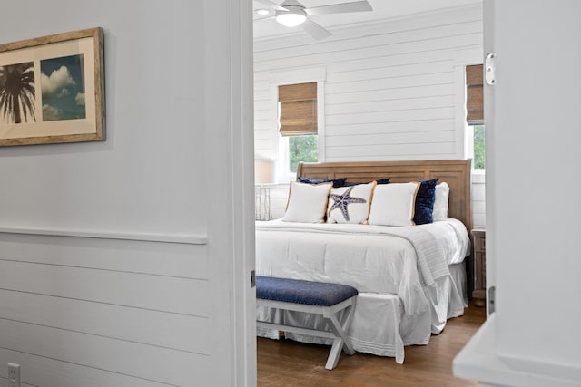 14 The Heron Cv, Inlet Beach, FL 32461 - bedroom featuring wood finished floors, wood walls, and a ceiling fan