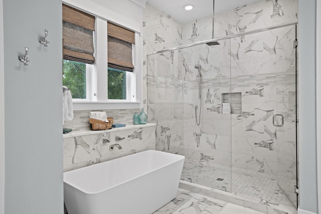 14 The Heron Cv, Inlet Beach, FL 32461 - bathroom with marble look tile flooring, a freestanding bath, a marble finish shower, and recessed lighting