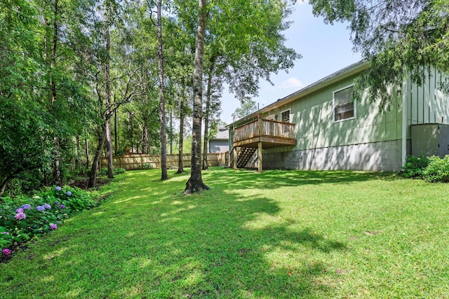 319 Key Lime Pl, Crestview, FL 32536 - view of yard with stairs and a wooden deck