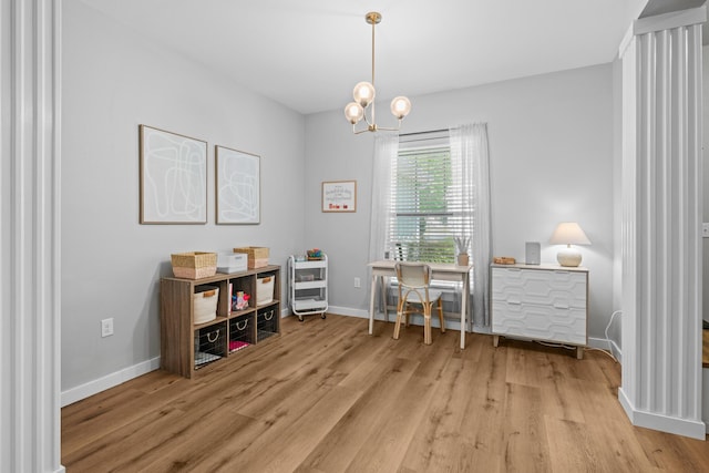 319 Key Lime Pl, Crestview, FL 32536 - office space featuring light wood finished floors, baseboards, and a chandelier