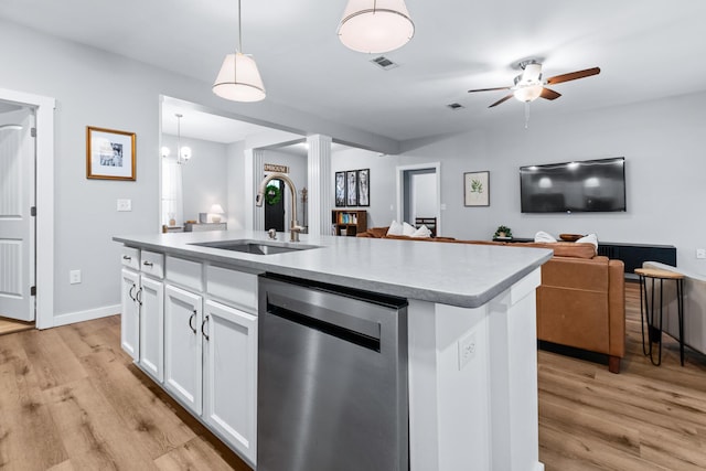 319 Key Lime Pl, Crestview, FL 32536 - kitchen featuring dishwasher, a sink, light wood-style floors, and open floor plan