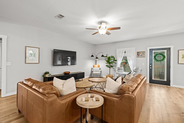 319 Key Lime Pl, Crestview, FL 32536 - living room with a ceiling fan, light wood finished floors, and baseboards