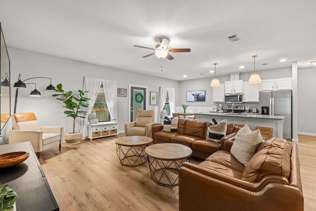 319 Key Lime Pl, Crestview, FL 32536 - living room with ceiling fan, light wood-style flooring, recessed lighting, and baseboards